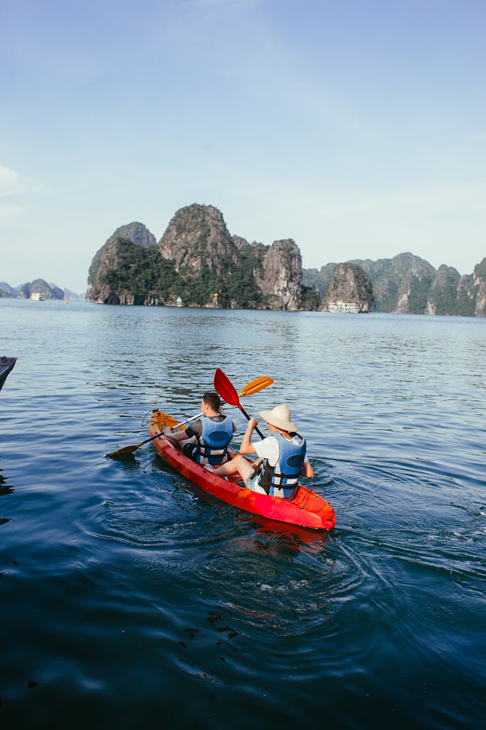 People Kayaking on the Sea